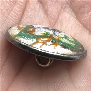 Japanese Gin bari foil enamel button of a green dragon set in silver.