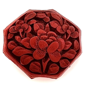 Unusual octagon shaped Chinese carved cinnabar button of a peony flower.