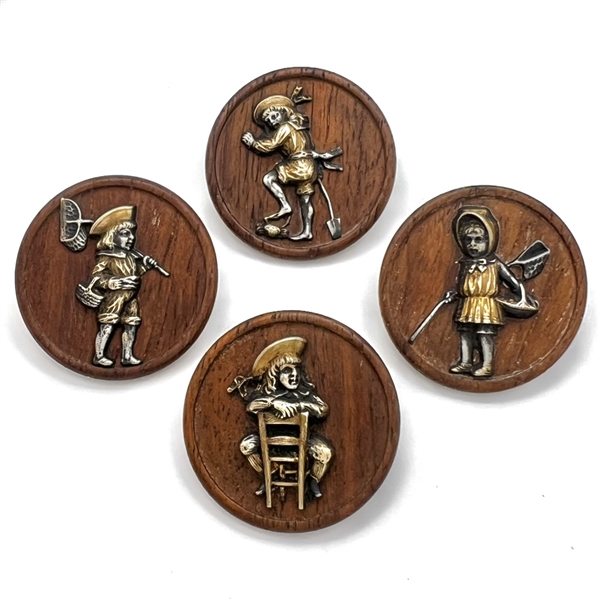 Rare set of four wooden buttons of Victorian children doing activities. 