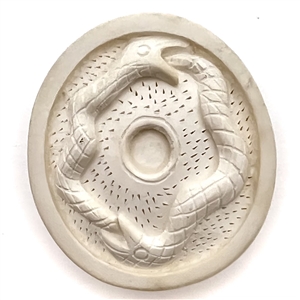 Carved meerschaum button of two snakes.