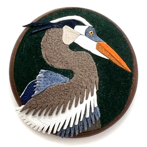 Unique leather studio button of a heron by Diane Wieler. 
