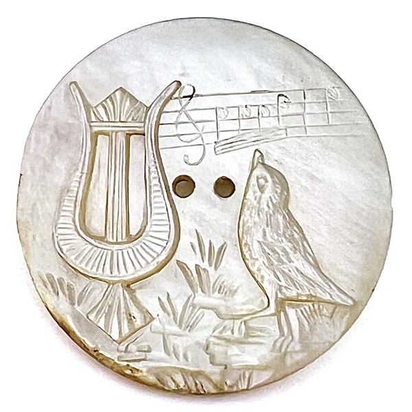 Pearl button of music - a harp, musical staff with notes and a singing bird.