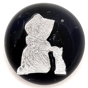 Glass paperweight studio button by Nancy Dubois and John Gooderham of a girl petting a cat.