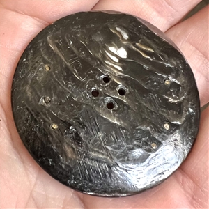 Cameo carved pearl button of a horseshoe with pastes.