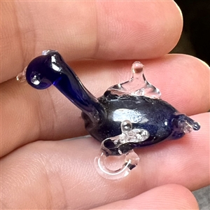 Delicate lamp worked glass studio button of a swan.