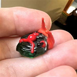 Jacques Israel lamp worked glass studio button of a funny face with horns.