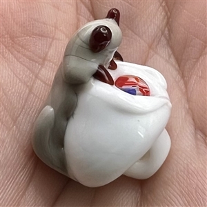 Michael S. Edmondson lamp worked glass studio button of a cat looking at a fish.