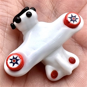 Michael S. Edmondson lamp worked glass studio button of an airplane.