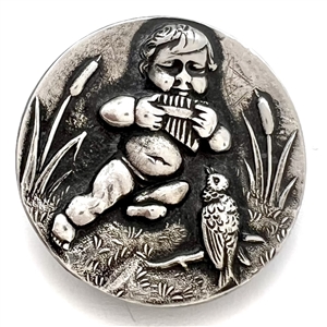 Silver button of Putto piping to a bird.