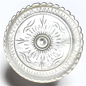 An 18th c. transitional carved pearl button.