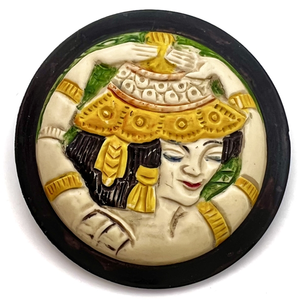 Fabulous vintage painted casein button of a dancing woman. 