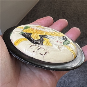 Fabulous vintage painted casein button of a dancing woman. 
