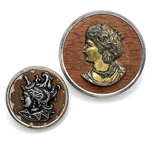 Two wood background buttons of heads.