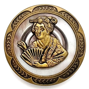 Unusual button with brass escutcheon of Katisha from the Mikado over pearl set in metal. 