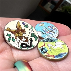 Three adorable enamel buttons of birds.