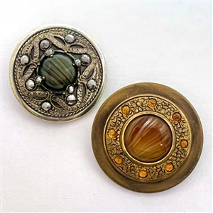 Two Victorian jewel buttons.