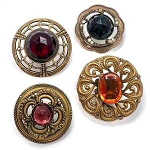 Four Victorian jewel buttons.