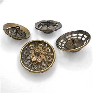Four Victorian jewel buttons.