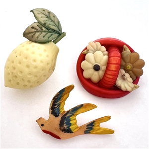 Three FABULOUS vintage celluloid buttons. 