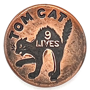 “TOM CAT" 9 Lives Overall button.