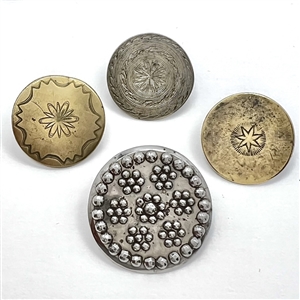 Three 18th c. Tombac buttons and one 18th c. Riveted steel button. 