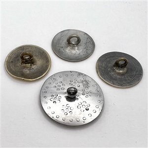 Three 18th c. Tombac buttons and one 18th c. Riveted steel button. 