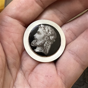 A 19th c. Liverpool transfer and painted ceramic of Greek man's head set in pearl button. 