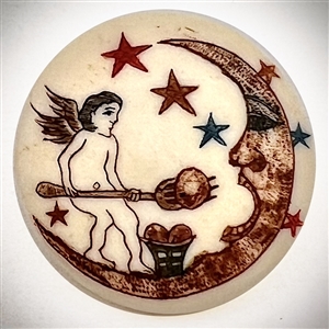 Natural material button of an angel feeding the the moon.