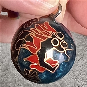 Champlevé enamel “bell" ball button of a dragon. 