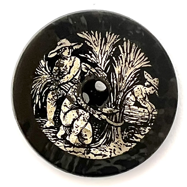 “The Reapers" composition whistle-hole button with an inset of crystalized tin.