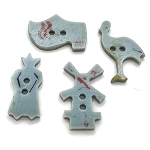 Set of four Dutch themed vintage casein realistic buttons. 