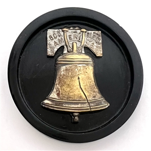 Brass over celluloid Liberty Bell button. 