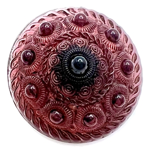Purple glass with cone shank button.