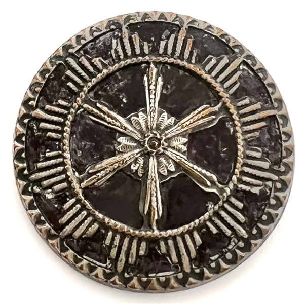 An 18th c. French repoussé button.