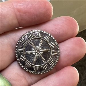 An 18th c. French repoussé button.