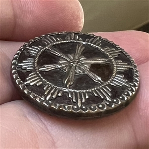 An 18th c. French repoussé button.