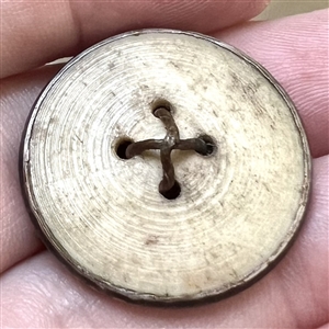 An 18th c. French repoussé button.