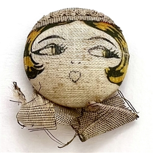 Vintage Betty Boop garter button from 1920s. 