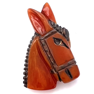 Bakelite button of a realistic donkey head.