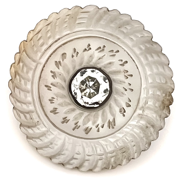 An 18th c. Carved pearl button with faceted paste center.