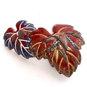 Lacquered and painted wood obi-dome of leaves.
