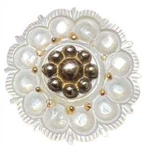 A medium size 18th c. Carved pearl button with gilded metal center.
