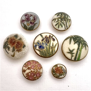 Seven Satsuma buttons of flowers and bamboo.
