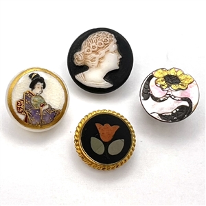 Four little cuties buttons.