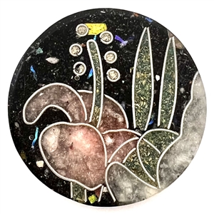 Design in plastic (DIP) button of plant life.