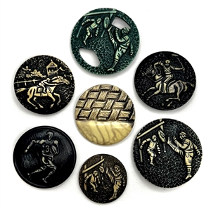 Seven vintage celluloid  buttons (one-piece 30s) mostly sport themes. 