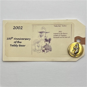 Anniversary “Teddy Bear" brass button on original card.