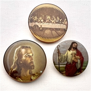 Three buttons depicting Jesus. 