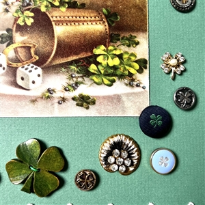Card of eighteen shamrock buttons . 