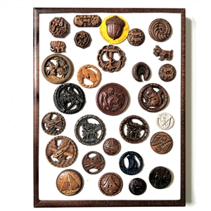 Framed card of twenty nine Burwood / Syrocco buttons.
